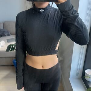 Elegant Black Long Sleeve with Cross Accent